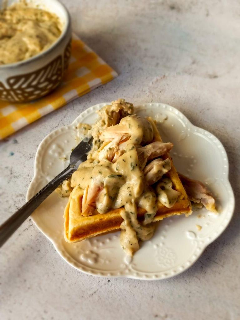Amish chicken and waffles on a plate.