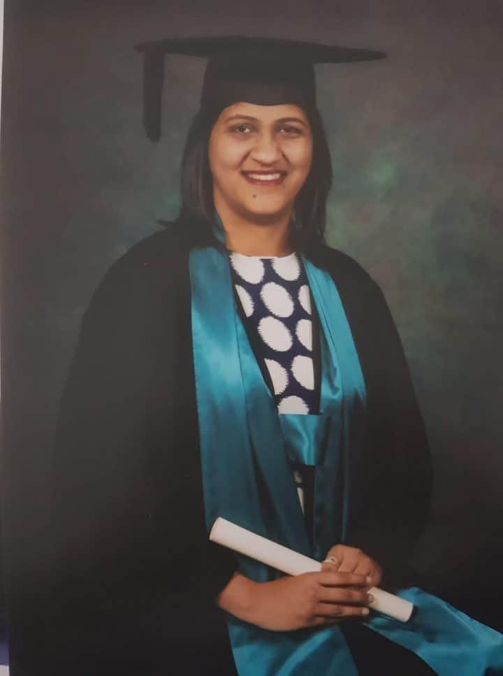 a photo of the author on her graduation day