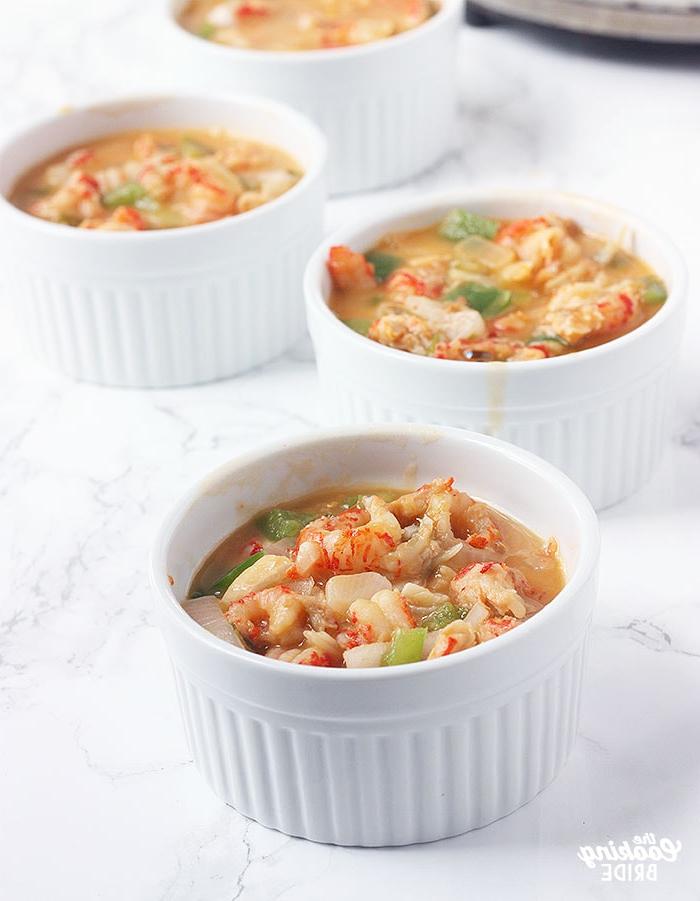 filling ramekins with crawfish filling