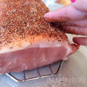 rub spice into mexican pork roast